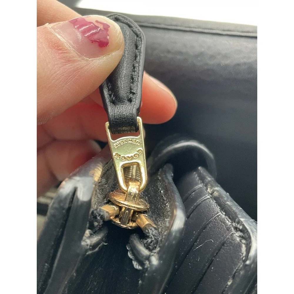 Coach signature one